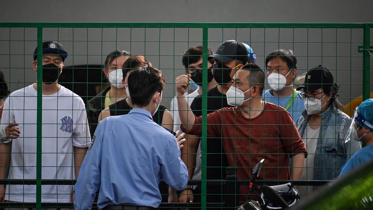 Shanghai residents confront officials after swift return of lockdown